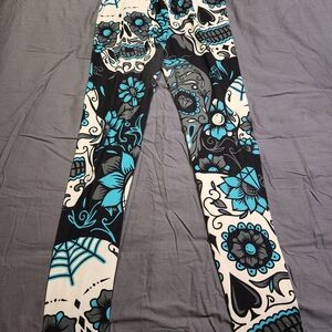 H&M Black and Teal Skull Print Leggings